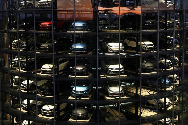 Auto industry expands open-source pact to boost development, cut costs